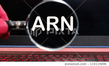 ARN as Account Reference Number written text on the monitor found through a magnifying glass ARN as Account Reference Number written text on the monitor found through a magnifying glass 110119896