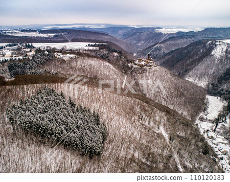 aerial view rock with medieval castle Ehrenburg near moselle river Brodenbach white winter snow wonderland forest hills 110120183
