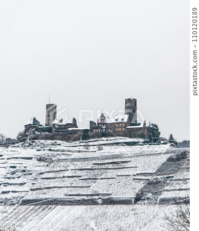 Winter at Burg Thurant Castle at the Mosel vineyards nestled in the hills above the Moselle River Germany Town Alken Winter at Burg Thurant Castle at the Mosel vineyards nestled in the hills above the Moselle River Germany Town Alken 110120189