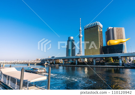 Tokyo cityscape in Japan: View of the Emeraldas and others departing from the Asakusa water bus boarding area = December 29, 2020 110120942