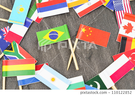 The concept is diplomacy. In the middle among the various flags are two flags - China, Brazil The concept is diplomacy. In the middle among the various flags are two flags - China, Brazil 110122852