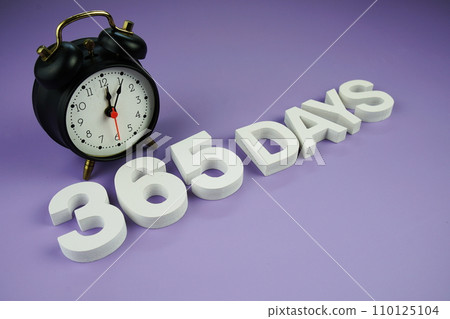 365 Days alphabet letters with alarm clock top view on purple background, business and education concept background 365 Days alphabet letters with alarm clock top view on purple background, business and education concept background 110125104