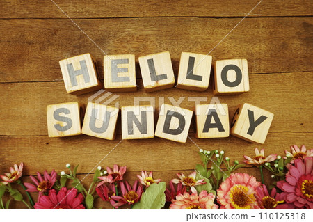 Hello sunday alphabet letter with space copy on wooden background 110125318