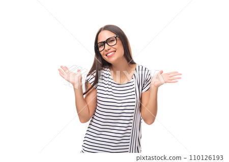 young cheerful energetic caucasian brunette woman in a striped t-shirt smiling on a white background 110126193
