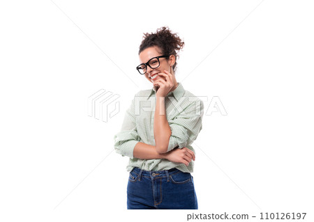 young slender brunette assistant woman in glasses dressed in a shirt and jeans 110126197