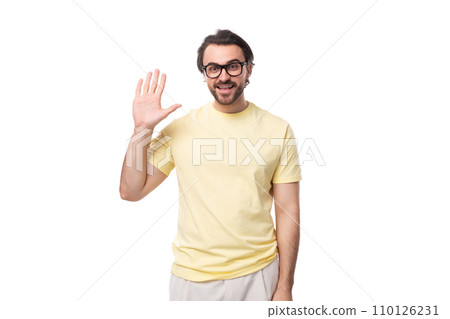 young caucasian man with black hair and beard greets with hugs young caucasian man with black hair and beard greets with hugs 110126231