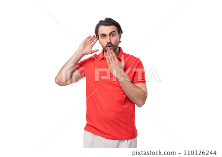 a young confused caucasian brunette man with a well-groomed beard is trying to understand looking at a young confused caucasian brunette man with a well-groomed beard is trying to understand looking at 110126244