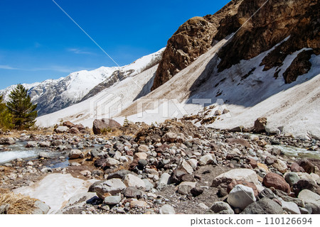 Snowy mountains, mountain river. Elbrus region, Caucasus. Snowy mountains, mountain river. Elbrus region, Caucasus. 110126694