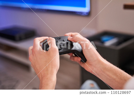 Gamer boy in his room 110128697