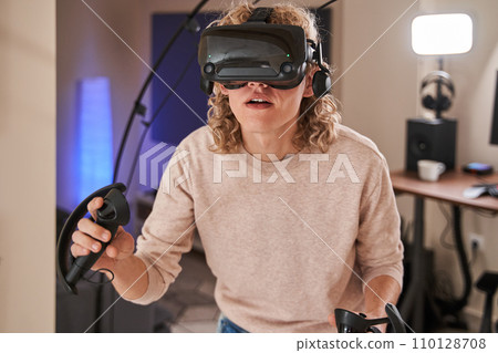 Young active guy in his room 110128708