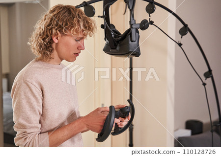 Gamer boy in his room Gamer boy in his room 110128726