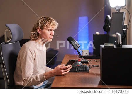 Gamer boy in his room Gamer boy in his room 110128763