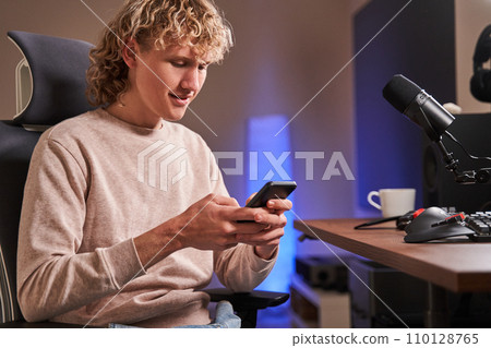 Gamer boy in his room Gamer boy in his room 110128765