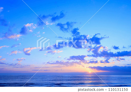 The sun rising from the horizon, late December 110131150