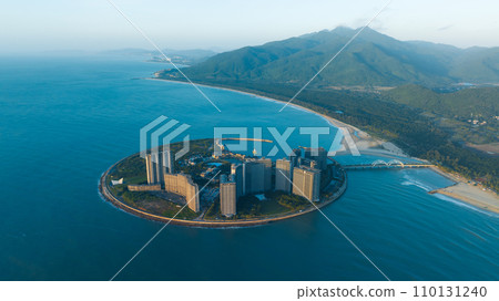 Aerial view of sunrise over sea landscape 110131240