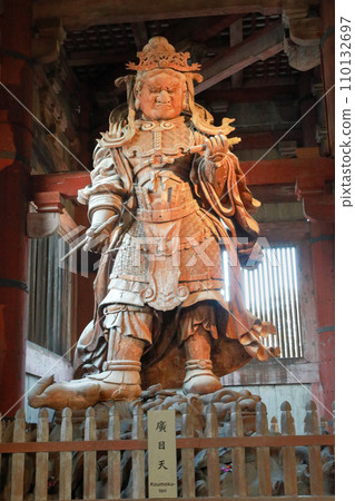 Tamonten, the guardian deity of the west direction of the Great Buddha Hall of Todaiji Temple, the head temple of the Kegon sect, the standing statue of Komokuten Tamonten, the guardian deity of the west direction of the Great Buddha Hall of Todaiji Temple, the head temple of the Kegon sect, the standing statue of Komokuten 110132697