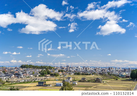 Suburban landscape with a refreshing blue sky 110132814