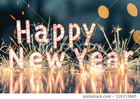 Happy new year in sparkler firework bokeh background. 110133665