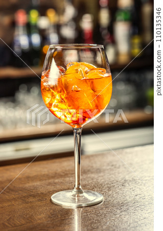 Aperol Spritz cocktail drink on the bar counter ready for the guest 110135346