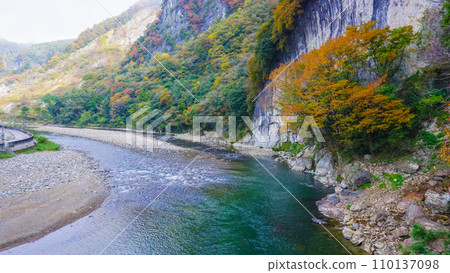 Ikura Cave and Ikura Falls during the autumn leaves season Ikura Cave and Ikura Falls during the autumn leaves season 110137098