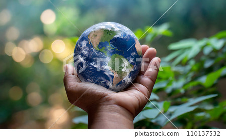 Hand holding a small globe (AI generated image) 110137532
