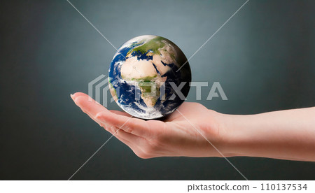 Hand holding a small globe (AI generated image) 110137534
