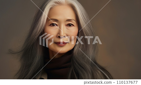 Smiling, elderly, chic Asian woman with gray long hair and perfect skin, on a creamy beige background, banner. Smiling, elderly, chic Asian woman with gray long hair and perfect skin, on a creamy beige background, banner. 110137677