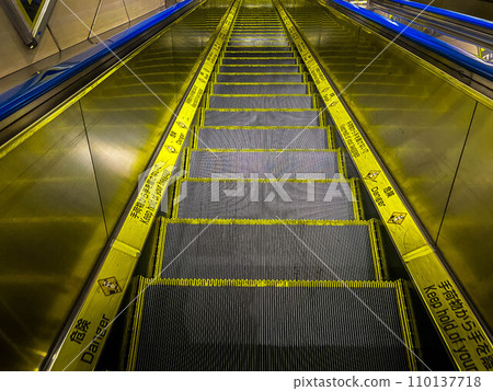 escalator to the underground 110137718