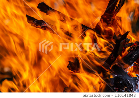 Flame of charcoal fire. Hearth for cooking and heating. Danger in forest Flame of charcoal fire. Hearth for cooking and heating. Danger in forest 110141848