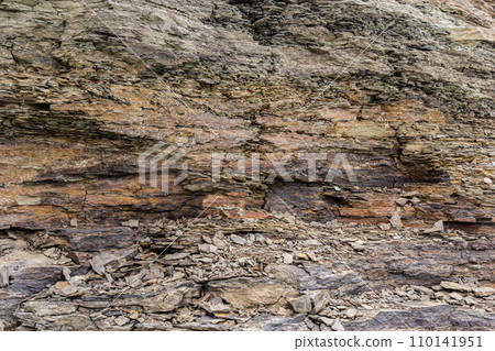 Rough rocky mountain texture. Sedimentary rock texture Rough rocky mountain texture. Sedimentary rock texture 110141951