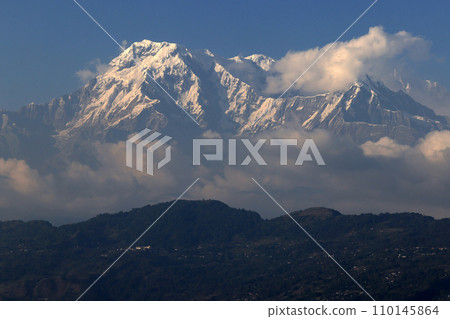 Annapurna South snow mountain in Nepal in day time 110145864