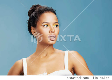 Woman american make-up blue fashion studio beauty face smile curly portrait happiness skin african hair lifestyle Woman american make-up blue fashion studio beauty face smile curly portrait happiness skin african hair lifestyle 110146146