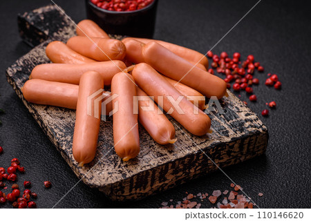 Delicious small sausages with salt, spices and herbs Delicious small sausages with salt, spices and herbs 110146620