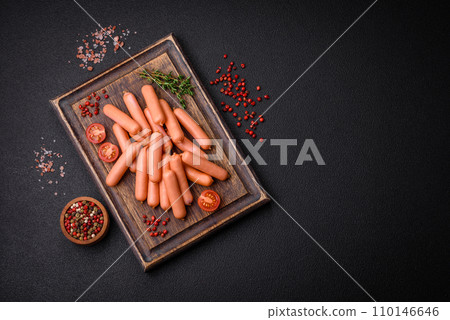 Delicious small sausages with salt, spices and herbs Delicious small sausages with salt, spices and herbs 110146646