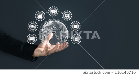 A person holding world to plan in e-business, the use of online digital network technology in business, buying and selling commerce online digital marketplace A person holding world to plan in e-business, the use of online digital network technology in business, buying and selling commerce online digital marketplace 110146710