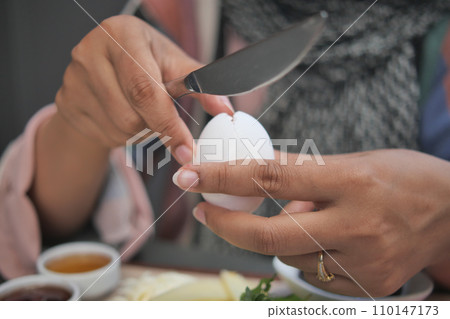 women hand perfectly Peeled Boiled Eggs women hand perfectly Peeled Boiled Eggs 110147173