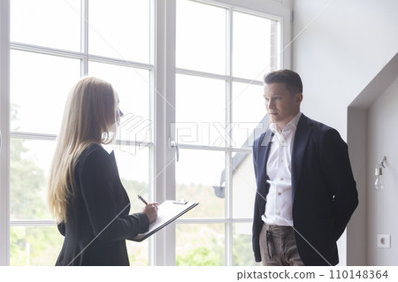 Architect writes client preferences for new residence 110148364