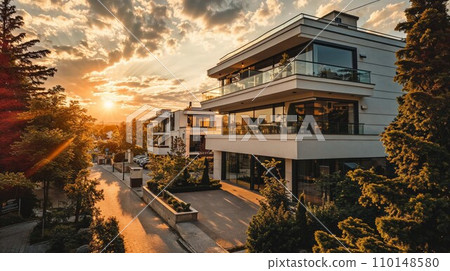 Panoramic view of a luxury dental clinic's facade, showcasing its modern architecture and premium branding, set in an affluent neighborhood, illustrating the clinic's prestigious status and appeal 110148580