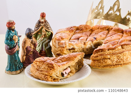 Epiphany cake on wooden table. Galette des rois traditional Epiphany cake in France 110148643
