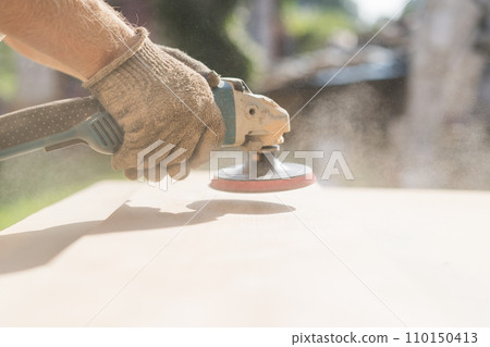 Grinding of an oak board with an angle grinder Grinding of an oak board with an angle grinder 110150413