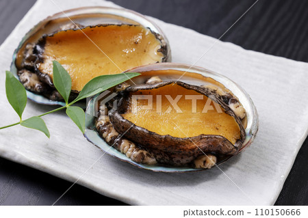 Abalone from Hokkaido placed on a black background Abalone from Hokkaido placed on a black background 110150666