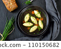 Bavarian, Swabian and Austrian dish - semolina dumplings  in a vegetable broth 110150682