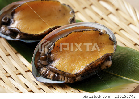 Hokkaido abalone on a colander Hokkaido abalone on a colander 110150742