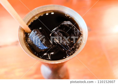 Iced coffee in an antique cup 110152607