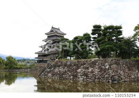 National treasure Matsumoto Castle reflected in the moat National treasure Matsumoto Castle reflected in the moat 110153254