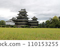 Matsumoto Castle shining against the cloudy sky 110153255