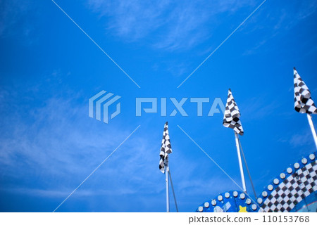 blue sky and checkered flag blue sky and checkered flag 110153768