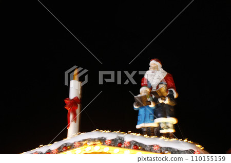 Santa Claus and children. Celebrate the holy night with hymns Santa Claus and children. Celebrate the holy night with hymns 110155159