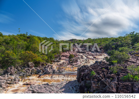 Roncador River long exposure landscape with silky water and moving clouds Roncador River long exposure landscape with silky water and moving clouds 110156542
