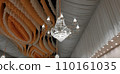 decorative Crystal chandelier lamp on the ceiling in weeding banquet hall. 110161035